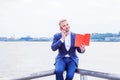 Young American Businessman with beard traveling, relaxing outside in New York City Royalty Free Stock Photo