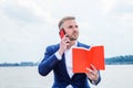 Young American Businessman with beard traveling, relaxing outside in New York City Royalty Free Stock Photo