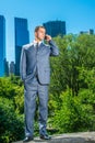 Young American Businessman talking on cell phone, traveling, working in New York