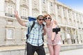 Young American couple enjoying Spain holiday trip taking selfie photo self portrait with mobile phone