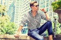 Young American Man relaxing outside in New York City Royalty Free Stock Photo