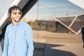 Young American man smiling happy with sunglasses portrait outdoor Royalty Free Stock Photo