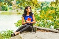 Young American Woman traveling, relaxing at Central Park, New Yo Royalty Free Stock Photo