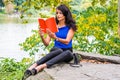 Young American Woman traveling, relaxing at Central Park, New Yo Royalty Free Stock Photo