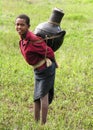 Young Amhara woman carrying water, Ethiopia