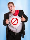 Young angry tearing his shirt - traffic symbol on it Royalty Free Stock Photo