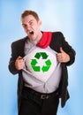 Young angry tearing his shirt - dollar recycling symbol on it Royalty Free Stock Photo