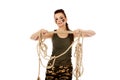 Young angry soldier woman tugging a rope Royalty Free Stock Photo