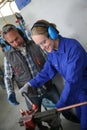 Young apprentice woman in plumbery Royalty Free Stock Photo