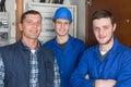 Young apprentices with electrician professional