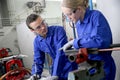 Young apprentices in plumbery training Royalty Free Stock Photo