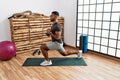 Young arab man training with kettlebell at sport center Royalty Free Stock Photo