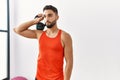 Young arab man training with kettlebell at sport center Royalty Free Stock Photo