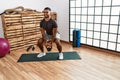 Young arab man training with kettlebell at sport center Royalty Free Stock Photo
