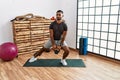 Young arab man training with kettlebell at sport center Royalty Free Stock Photo