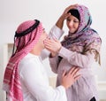 Young arab muslim family with pregnant wife expecting baby Royalty Free Stock Photo