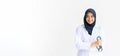 Young Arab Muslim intern doctor women smile on isolate white background concept for Islam people working in medical hospital healt
