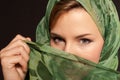 Young arab woman with veil showing her eyes dark Royalty Free Stock Photo