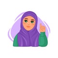 Young arab woman wearing hijab raising finger, explaining and teaching