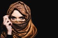 Young Arabian Muslim woman in hijab, studio shot