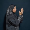 Young arabian woman in hijab with closed eyes Royalty Free Stock Photo