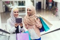 Young Arabian Women Using Tablet Pc on Shopping.