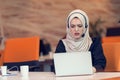 Young Arabic business woman wearing hijab,working in her startup office. Royalty Free Stock Photo