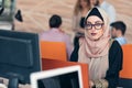 Young Arabic business woman wearing hijab,working in her startup office. Royalty Free Stock Photo