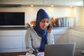 Young Arabic female entrepreneur working at her kitchen table Royalty Free Stock Photo