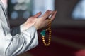Young Arabic Muslim man  praying. Doing a dailly pray inside modern beautiful mosque Royalty Free Stock Photo