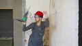 Young architect dancing in the construction building.