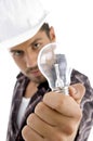 Young architect showing electric bulb Royalty Free Stock Photo