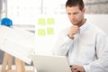 Young architect working on laptop Royalty Free Stock Photo