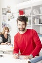 Young architect working in studio. Royalty Free Stock Photo