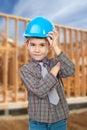Young arhitect with helmet greets Royalty Free Stock Photo
