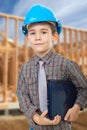 Young arhitect with helmet. Man using laptop Royalty Free Stock Photo