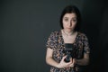 young armenian ukrainian woman making photos with vintage camera Royalty Free Stock Photo