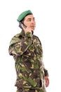 Young army soldier with beret speaking on phone Royalty Free Stock Photo