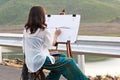 Young artist sketching a landscape Royalty Free Stock Photo