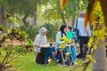 Young artists paint en plein air in a city park