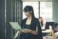 Young asia business woman working together in office space Royalty Free Stock Photo