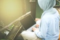 Young asia muslim woman work out office chill on green nature pa