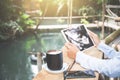 Young asia muslim woman work out office chill on green nature pa Royalty Free Stock Photo