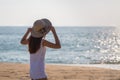 Young asia woman with hat on beach Royalty Free Stock Photo