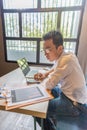 Young Asian accountant working on financial business documents