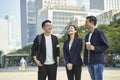 Young asian adults standing talking on street Royalty Free Stock Photo