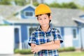 Young Asian Architect with house background Royalty Free Stock Photo