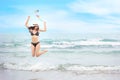 Young asian beautiful and sexy girl in bikini who jumping in the air with happy and smile face with blue sky on holiday vacation Royalty Free Stock Photo