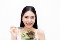 Young Asian beautiful smiling slim woman eating vegetable salad - healthy and diet eating lifestyle concept Royalty Free Stock Photo