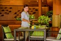 Young asian beautiful waitress serving table in the restaurant